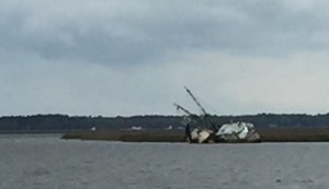 Oops.  Hard aground ship is a monumental reminder of the danger of shoaling in the Fernandina area.