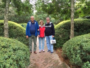 Cliff, Ann and Will in the beautiful garden at the Ships of the Sea Museum.