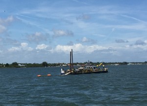 This is a dredge working in the ICW channel (and taking up a good portion of the narrow waterway!)