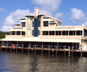 This is a shot I took yesterday as we cruised by Blue Moon Fish Company.  It is just to the north of the Commercial Blvd. bridge -- at 9 feet clearance it guarantees that all the boats on the ICW "pose" here. 