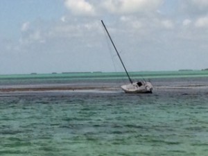 And this sailboat shows how difficult it can be to navigate through all the shallows.  This boat looks like it's been here a while -- completely stripped of sails and gear.